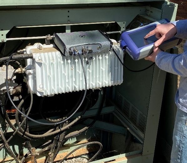 Picture of VeEX's SWP-BOX portable cable plant sweep system being used at an amplifier